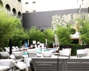 Scorching nymph stroking by motel pool