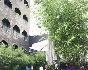 Scorching nymph stroking by motel pool