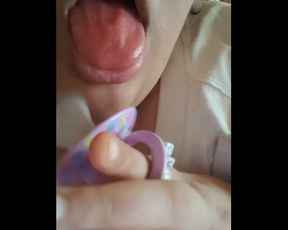 Gargling and Playing with Adult Pacifier