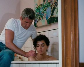 Nancy Travis nude, Annabella Sciorra nude – Internal Affairs (1990)