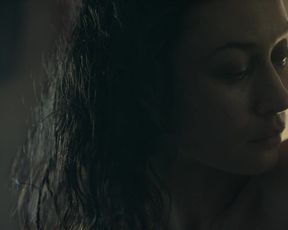 Olga Kurylenko, Marine Duvivier - Sentinelle (2021) celebrity nude boobs scene