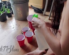 Voyeurism a nude gal planting plants