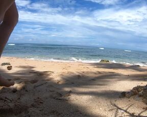 I'm bare on a sandy beach in the Indian Ocean