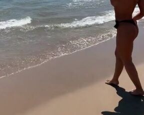 Topless Girl on a Public Beach