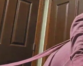 Grandma's topless sorting out her laundry