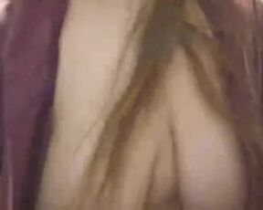 Grandma's topless sorting out her laundry