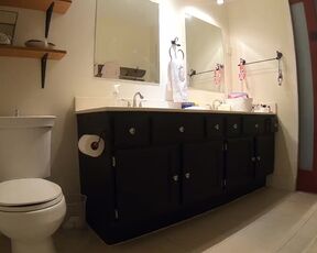 Bathroom peeing. My sandy-haired stepmom caught bare in robe