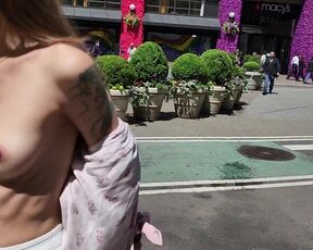 Breasts out switching my tee-shirt on a active Manhattan street!
