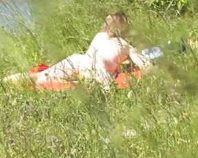 Outside. Naughty beach. Random passerby dude by sea spotted nude dame sunbathing. Outdoor. Naturist