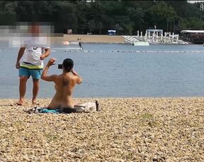 Naked on public beach got lube rubdown from stranger