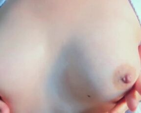 CLOSE-UP TITS. Amateur striptease on a cell phone camera