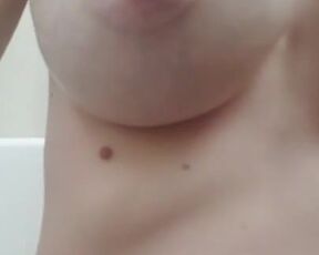 Milk drips from the pregnant lady's breasts