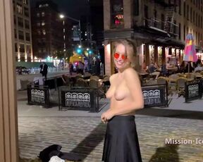 Switching into sheer sundress on a active downtown night