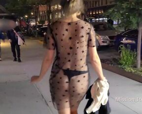 Switching into sheer sundress on a active downtown night