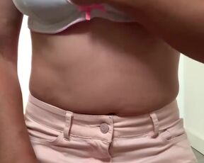 a damsel fiddles with her milk cans