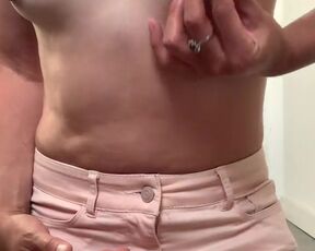 a damsel fiddles with her milk cans