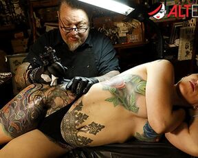 Busty babe Marie Bossette can hardly deal with the pain of getting a new tattoo
