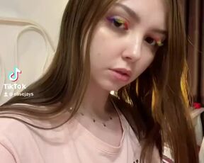 Nymphet shows her young tits on cam