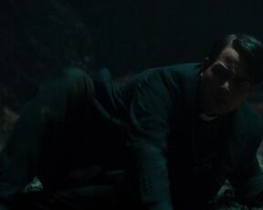 Carrie Munro nude - The Pope's Exorcist (2023) thriller topless