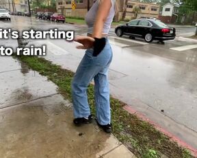 Ladies top gets humid in rain revealing knockers in public