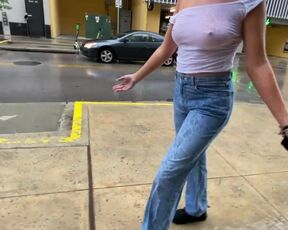 Ladies top gets humid in rain revealing knockers in public