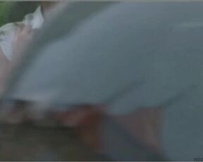 Sitting in a cafe, a hot brunette flashes her huge boobs