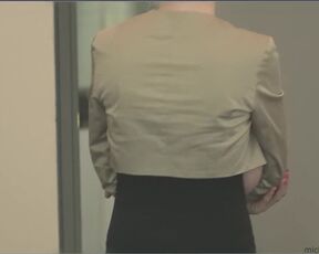 She covers her huge breasts with her hand and talks on the phone. Do you notice her nipple