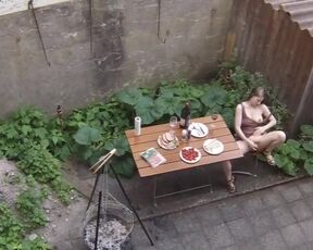 Peeping at a girl in the yard. Hot teenage neighbor