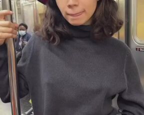 In the subway, a girl showed topless for Tiktok