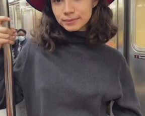 In the subway, a girl showed topless for Tiktok