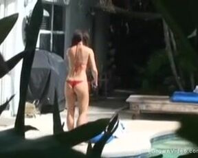 Meaty jug girl-friend providing a hj outside by the pool
