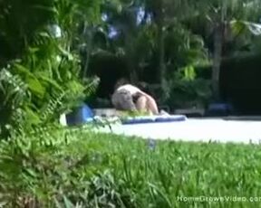 Meaty jug girl-friend providing a hj outside by the pool