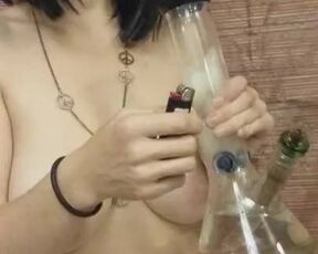 Chubby MILF with saggy tits smoking nude