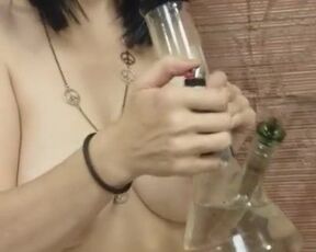 Chubby MILF with saggy tits smoking nude