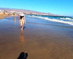 Public nudity walking sexy on the beach