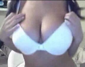 Amateur Pigtailed Brunette Stripteases And Dances