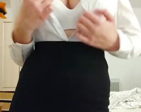 Office style and opens up the view of beautiful natural breasts