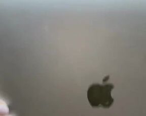 What's hiding the MacBook of this beauty girl. Are those big boobs? Let's see!