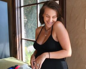 Hot Pregnant MILF is changing clothes. Her gorgeous body is beautiful even while pregnant.