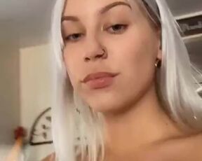 Dyed blonde drinks juice and shows her huge boobs to her subscribers