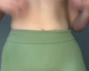 Silicone hottie changes her pants being topless all the time.