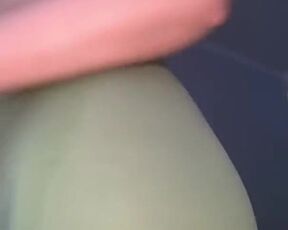 Silicone hottie changes her pants being topless all the time.