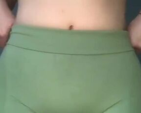 Silicone hottie changes her pants being topless all the time.