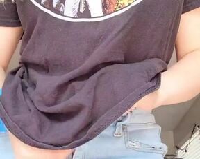 The geek girl's t-shirt hides big boobs. Shall we see? Maybe she'll be quick to show her pussy, too.