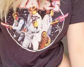 The geek girl's t-shirt hides big boobs. Shall we see? Maybe she'll be quick to show her pussy, too.