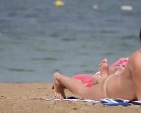 All- inborn, German dark-haired with thick mounds doesn't mind being bare-breasted on a local beach