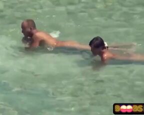 Wild duo is romping on the beach thinking that no one is observing them in act