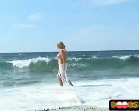 Sumptuous ash-blonde damsel is posing nude on the beach, and liking every single 2nd of it