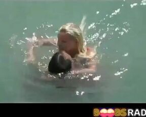 Naked girl is getting plowed on the beach and does not care if others are seeing her