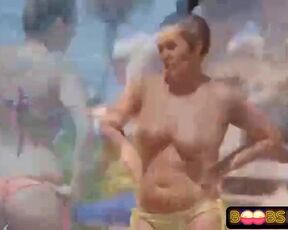 Superb looking honeys took off their tops on the beach, to get their baps suntanned